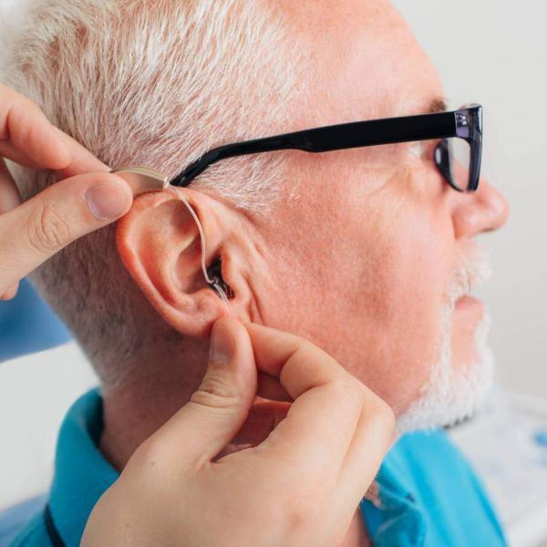 missouri worker with a hearing aid