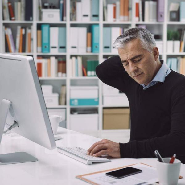 office worker with neck pain