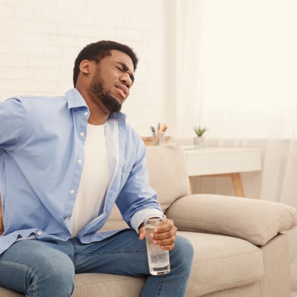 missouri worker on his couch with a back injury