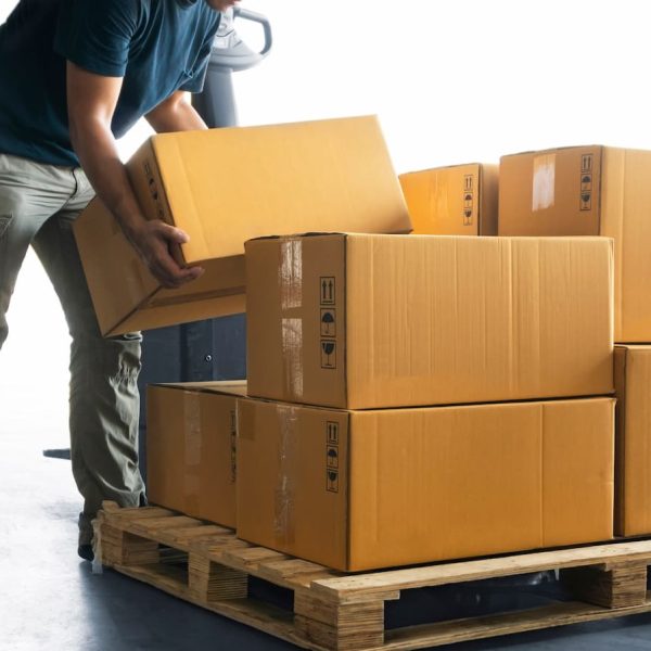 st. louis worker lifting a heavy box