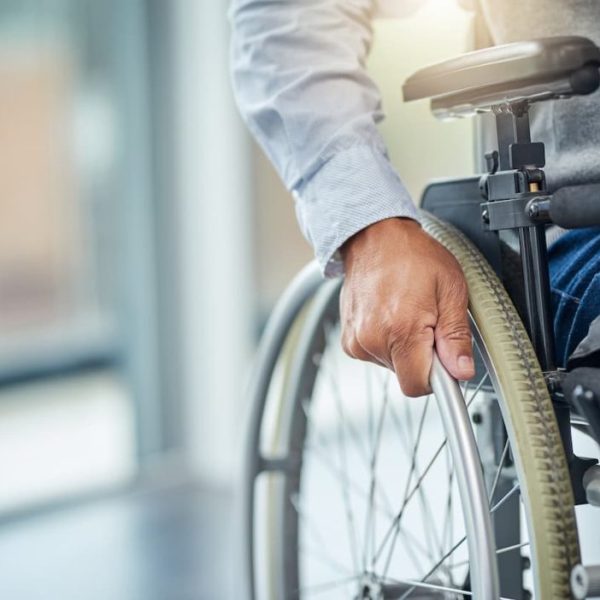 an injured worker in a wheelchair