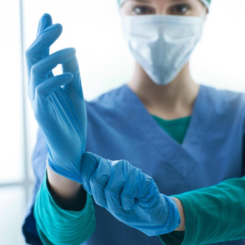medical worker with mask and gloves