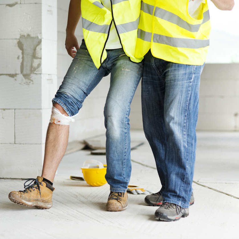 injured missouri worker being helped by fellow worker